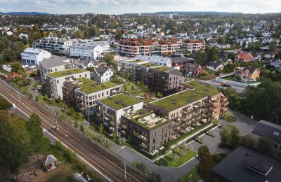 Droneillustrasjon over Poppelhagen. Fargerikebygg og mye grønt